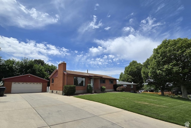 638 E 1050 N, Bountiful, UT 84010 - single story home featuring an outdoor structure, a front lawn, a chimney, a garage, and brick siding