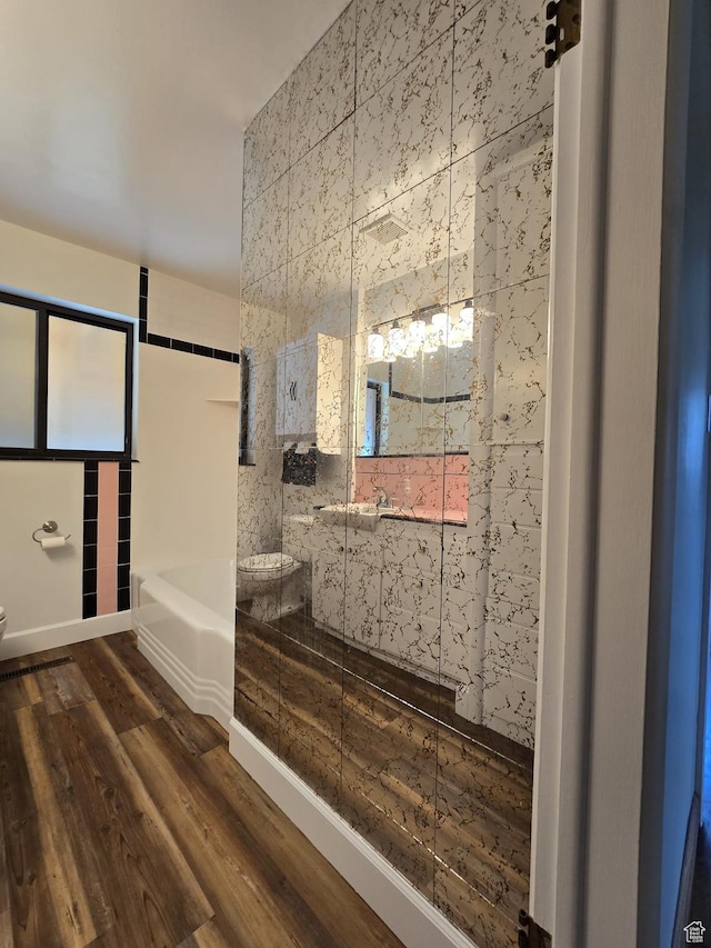 638 E 1050 N, Bountiful, UT 84010 - bathroom featuring a tub, wood finished floors, and a shower