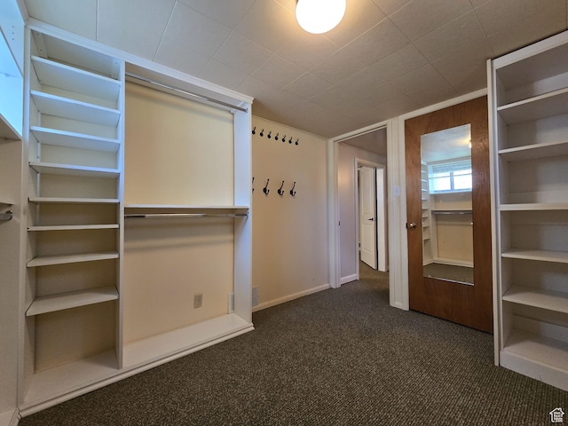 638 E 1050 N, Bountiful, UT 84010 - unfurnished bedroom featuring dark colored carpet and baseboards
