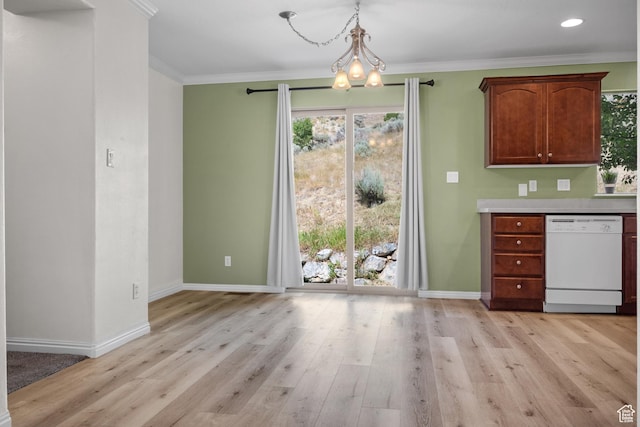 10574 N Sage Vista Ln, Cedar Hills, UT 84062 - kitchen featuring white dishwasher, a chandelier, light wood-style floors, ornamental molding, and light countertops