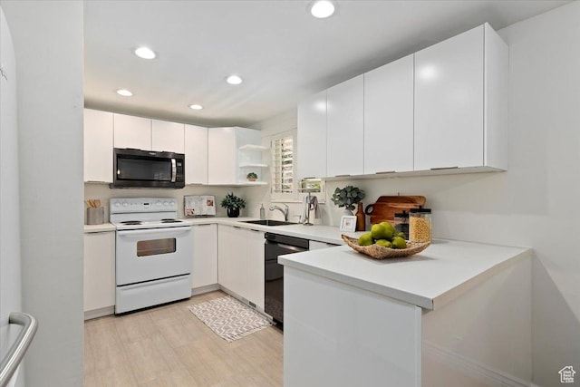 2268 E 7160 S, Cottonwood Heights, UT 84121 - kitchen featuring stainless steel microwave, white electric stove, dishwasher, light wood-type flooring, and light countertops