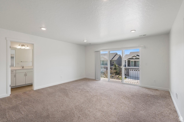 312 N 440 W, Pleasant Grove, UT 84062 - spare room featuring light colored carpet, a chandelier, and recessed lighting