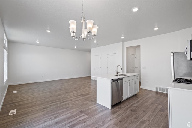 312 N 440 W, Pleasant Grove, UT 84062 - kitchen featuring appliances with stainless steel finishes, wood finished floors, recessed lighting, a kitchen island with sink, and a chandelier
