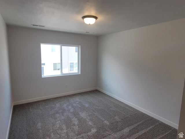 6846 S Static Peak Dr Unit 262, West Jordan, UT 84081 - empty room featuring carpet floors and baseboards