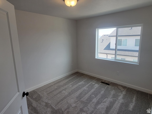 6846 S Static Peak Dr Unit 262, West Jordan, UT 84081 - empty room with dark carpet and baseboards