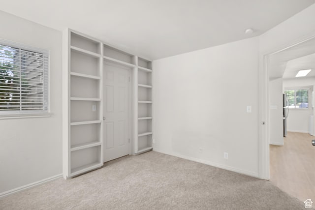 650 S Main St Unit 7105, Bountiful, UT 84010 - unfurnished bedroom featuring carpet and freestanding refrigerator