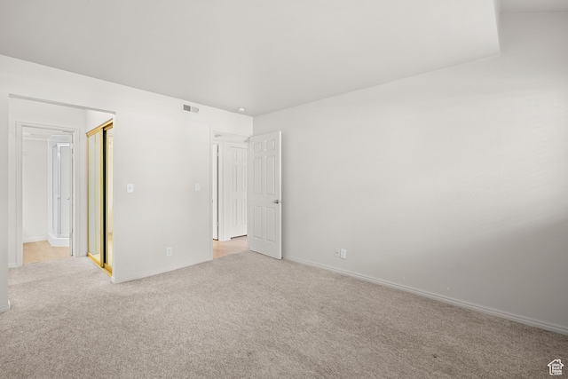 650 S Main St Unit 7105, Bountiful, UT 84010 - unfurnished bedroom with light colored carpet and baseboards