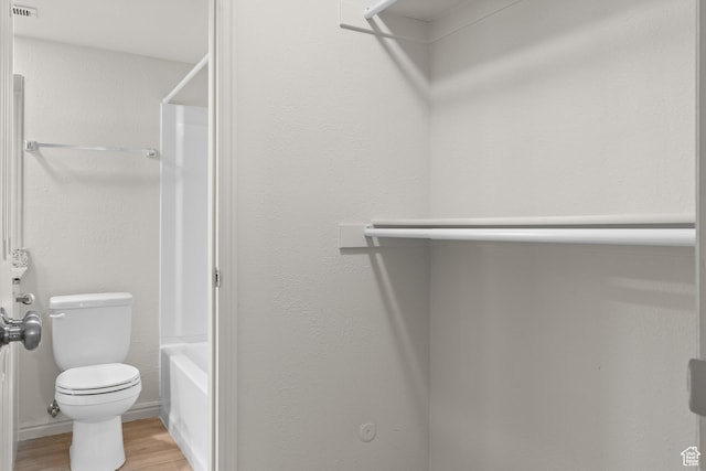 650 S Main St Unit 7105, Bountiful, UT 84010 - full bath featuring wood finished floors and shower / washtub combination