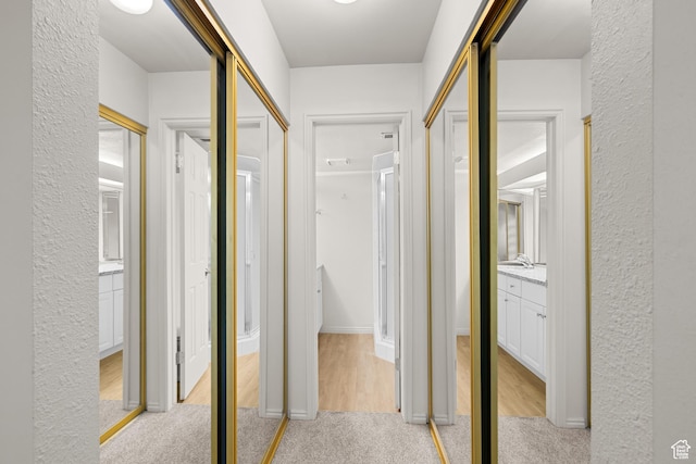 650 S Main St Unit 7105, Bountiful, UT 84010 - corridor featuring light carpet and a textured wall