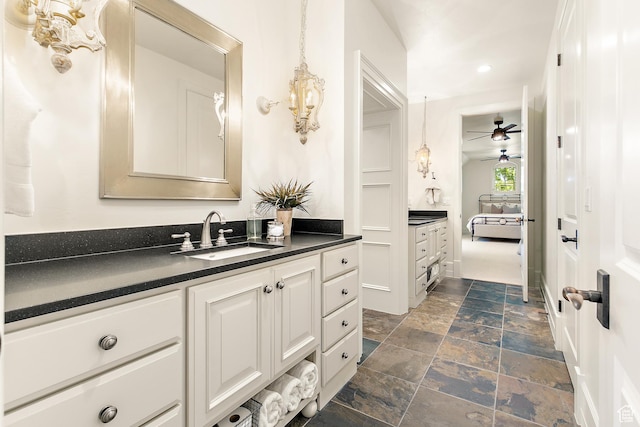 1095 N 700 W, American Fork, UT 84003 - bathroom with ceiling fan, vanity, stone tile floors, and recessed lighting