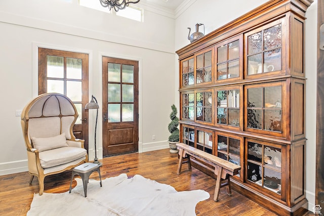 1095 N 700 W, American Fork, UT 84003 - living area with ornamental molding, a chandelier, wood finished floors, and a towering ceiling