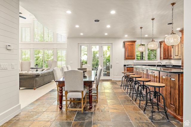 1095 N 700 W, American Fork, UT 84003 - dining area with stone tile floors, recessed lighting, plenty of natural light, and french doors