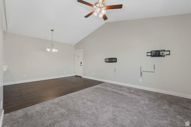 13073 S Newbridge Ln Unit E301, Herriman, UT 84096 - unfurnished living room featuring ceiling fan, a chandelier, dark carpet, dark wood-style floors, and high vaulted ceiling
