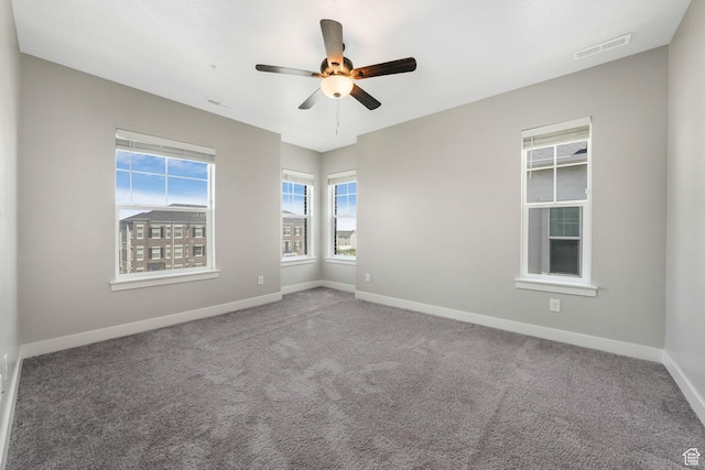 13073 S Newbridge Ln Unit E301, Herriman, UT 84096 - empty room featuring ceiling fan and carpet
