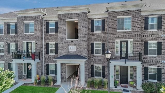 13073 S Newbridge Ln Unit E301, Herriman, UT 84096 - townhome / multi-family property featuring brick siding