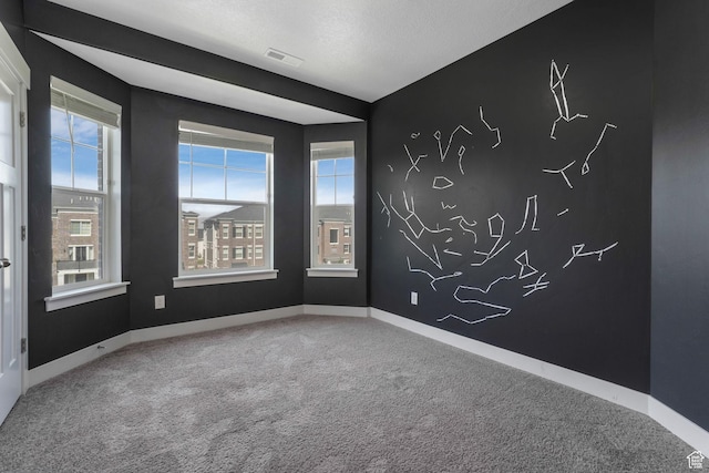 13073 S Newbridge Ln Unit E301, Herriman, UT 84096 - spare room featuring carpet flooring and healthy amount of natural light