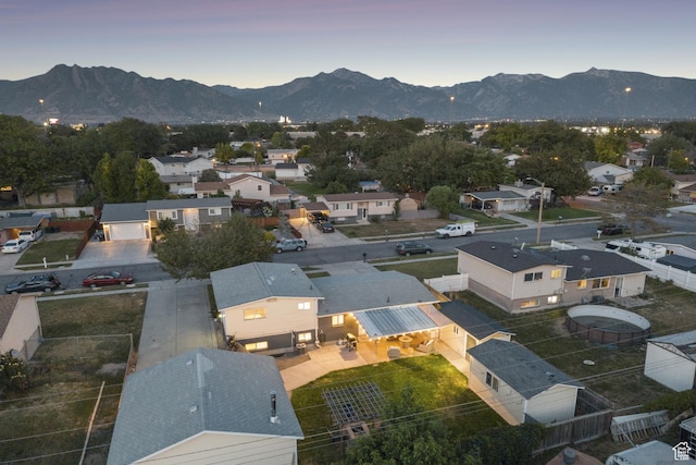 5964 S 610 W, Murray, UT 84123 - aerial view at dusk of a residential view and a mountain view