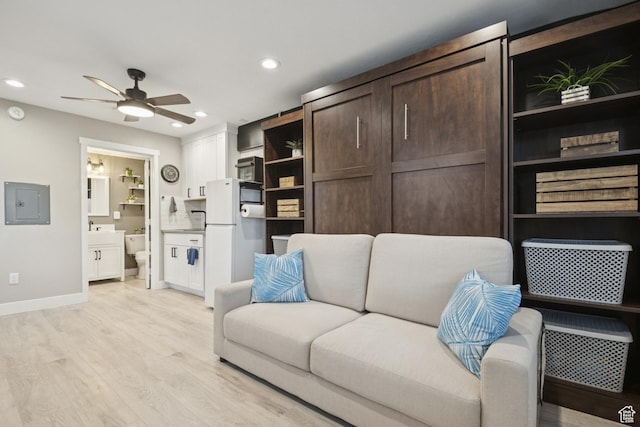 5964 S 610 W, Murray, UT 84123 - living room featuring a ceiling fan, electric panel, light wood-type flooring, and recessed lighting