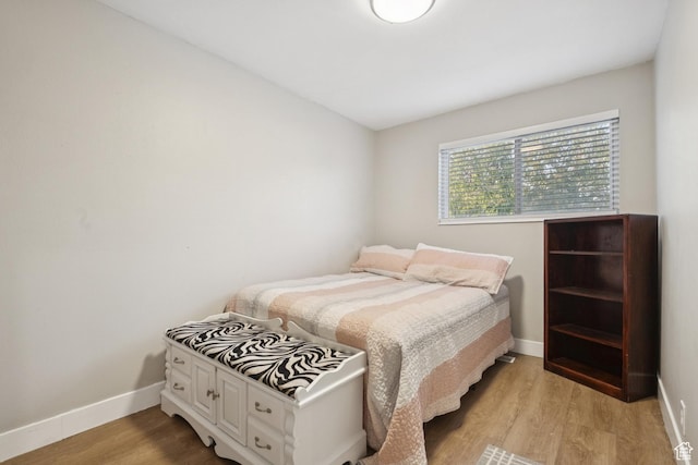 5964 S 610 W, Murray, UT 84123 - bedroom with baseboards and light wood-type flooring