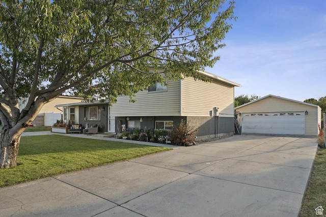 5964 S 610 W, Murray, UT 84123 - tri-level home featuring an outdoor structure, a front lawn, and a garage
