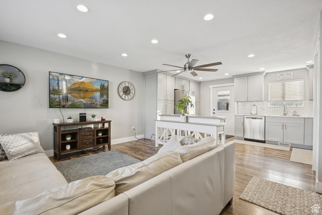 5964 S 610 W, Murray, UT 84123 - living room featuring recessed lighting, ceiling fan, and light wood-style flooring