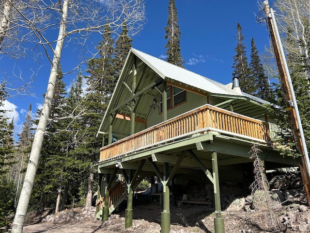 468 E Trail Rd, Brian Head, UT 84719 - view of side of property with a wooden deck and a metal roof