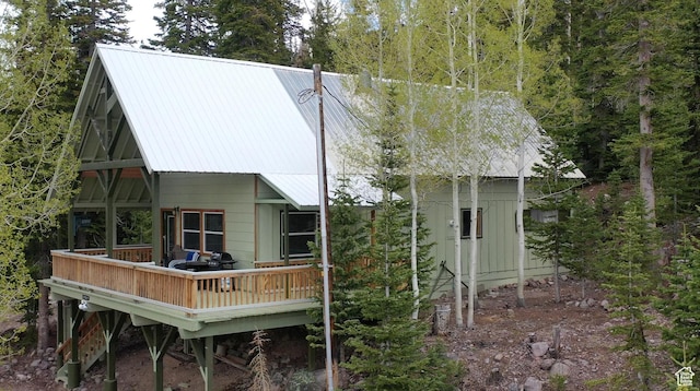 468 E Trail Rd, Brian Head, UT 84719 - back of house featuring a wooden deck and a metal roof