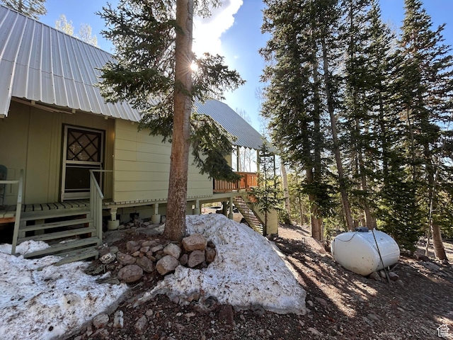 468 E Trail Rd, Brian Head, UT 84719 - view of property exterior featuring a metal roof and stairway