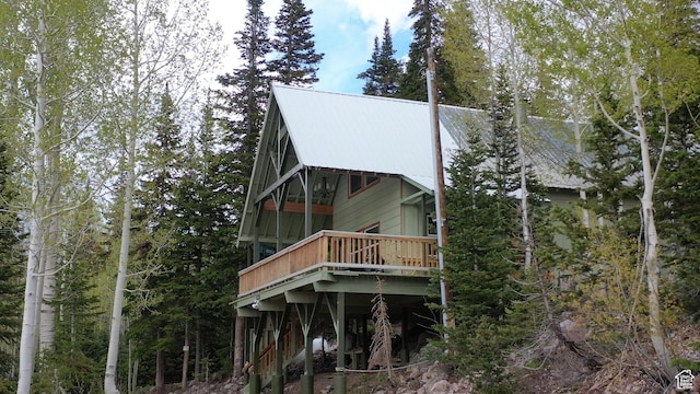 468 E Trail Rd, Brian Head, UT 84719 - rear view of property featuring a wooden deck and a metal roof