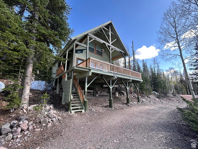 468 E Trail Rd, Brian Head, UT 84719 - rustic home with stairway and a deck