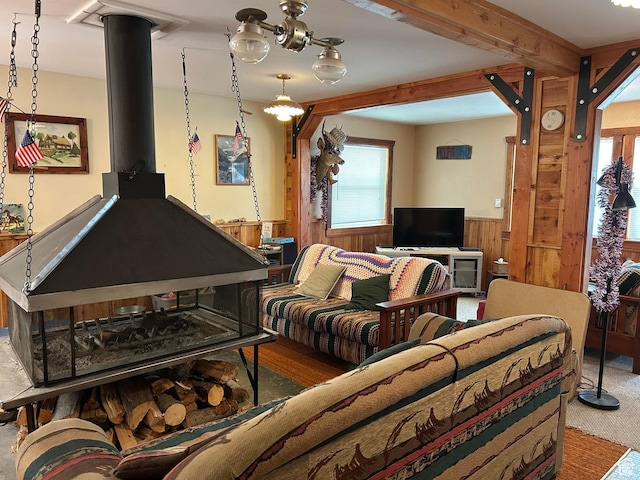468 E Trail Rd, Brian Head, UT 84719 - living room featuring a wainscoted wall, wood walls, and carpet flooring