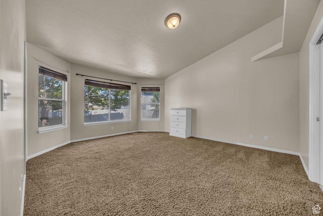 2361 N 75 E, Layton, UT 84041 - empty room featuring carpet floors, plenty of natural light, and lofted ceiling