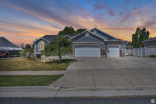 2361 N 75 E, Layton, UT 84041 - view of front of house featuring an attached garage and driveway