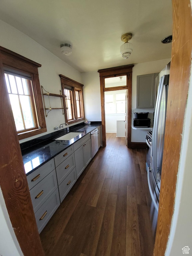 175 N 100 E, Price, UT 84501 - kitchen featuring dishwasher, gray cabinets, dark wood-type flooring, and open shelves