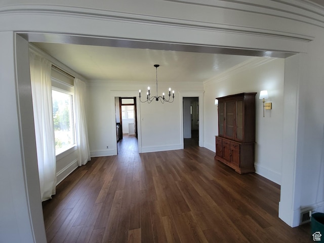 175 N 100 E, Price, UT 84501 - unfurnished dining area with a chandelier, dark wood-style flooring, and ornamental molding