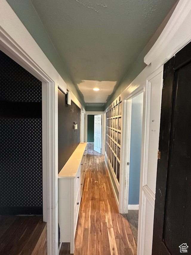 3836 W Jacquelyn St S, West Jordan, UT 84088 - hall featuring wood finished floors and baseboards