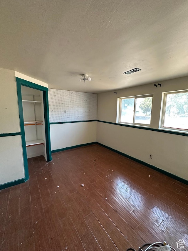 3836 W Jacquelyn St S, West Jordan, UT 84088 - empty room featuring baseboards and wood finished floors