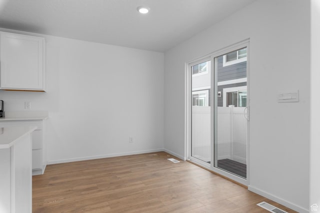 554 W 1870 S Unit 1195, Provo, UT 84601 - unfurnished dining area featuring light wood-type flooring and recessed lighting