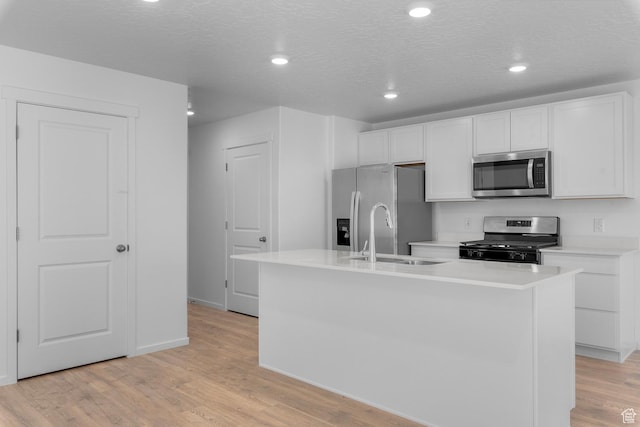 554 W 1870 S Unit 1195, Provo, UT 84601 - kitchen with stainless steel appliances, white cabinetry, light wood-style flooring, light countertops, and recessed lighting