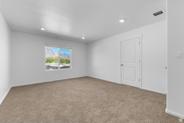554 W 1870 S Unit 1195, Provo, UT 84601 - spare room featuring carpet floors, a textured ceiling, and recessed lighting