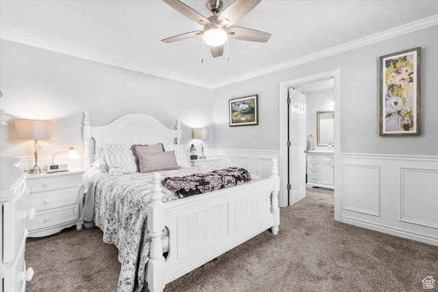 360 S 300 E, Ephraim, UT 84627 - carpeted bedroom featuring ornamental molding, wainscoting, a decorative wall, ceiling fan, and ensuite bath