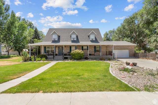 360 S 300 E, Ephraim, UT 84627 - cape cod-style house featuring brick siding, a garage, a porch, and concrete driveway