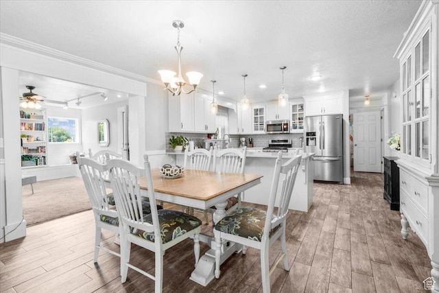 360 S 300 E, Ephraim, UT 84627 - dining room with a chandelier, light wood-style flooring, ceiling fan, crown molding, and recessed lighting