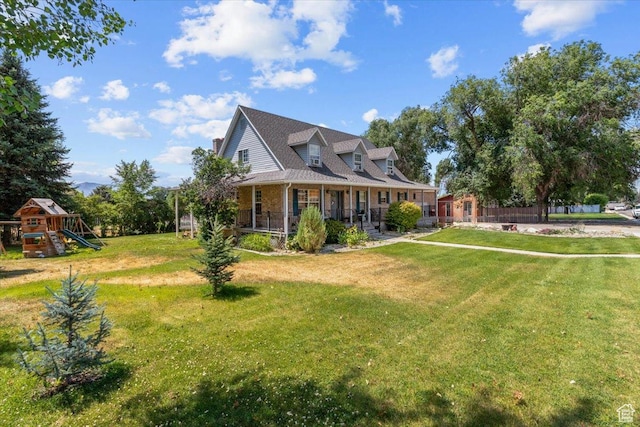 360 S 300 E, Ephraim, UT 84627 - view of front of home with a front lawn, covered porch, and a playground