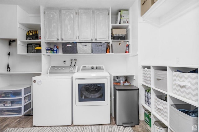 360 S 300 E, Ephraim, UT 84627 - washroom with washer and clothes dryer, wood finished floors, and cabinet space