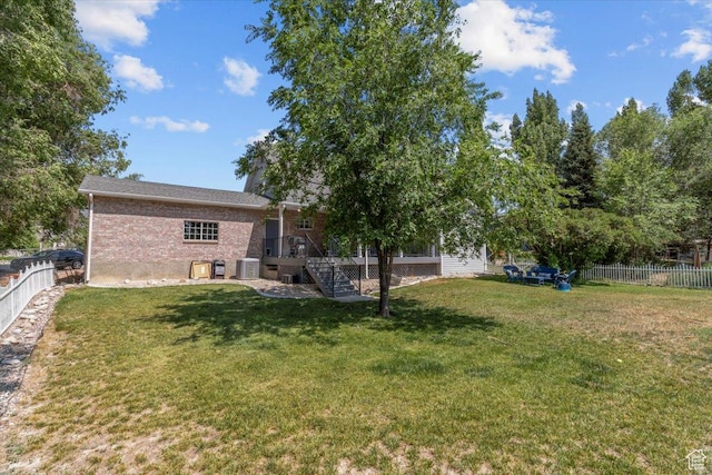 360 S 300 E, Ephraim, UT 84627 - back of house with brick siding, stairway, a fenced backyard, and a deck