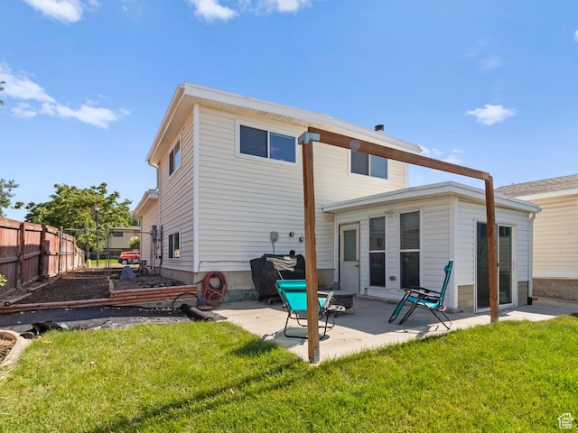 4954 W Elaine Dr S, West Valley City, UT 84120 - rear view of property featuring a patio area