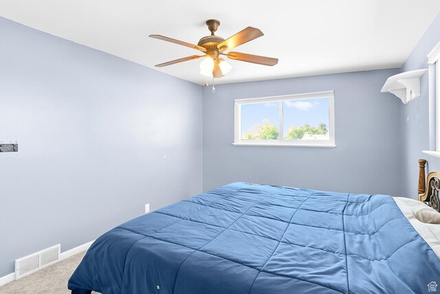 4954 W Elaine Dr S, West Valley City, UT 84120 - carpeted bedroom with baseboards and ceiling fan