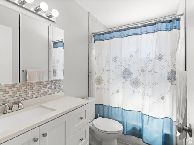 4954 W Elaine Dr S, West Valley City, UT 84120 - bathroom featuring decorative backsplash, vanity, and a shower with curtain