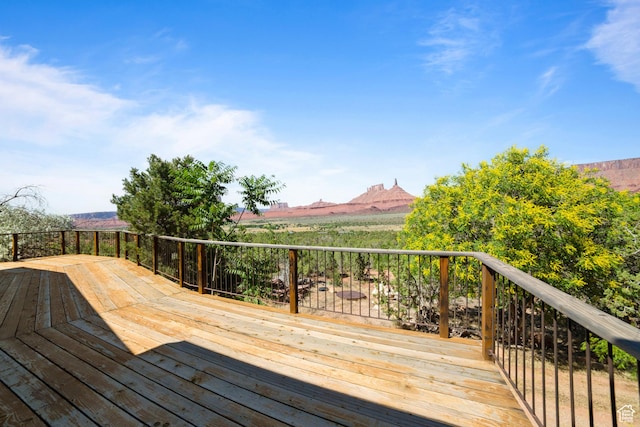 338 Taylor Ln, Castle Valley, UT 84532 - wooden deck featuring a mountain view